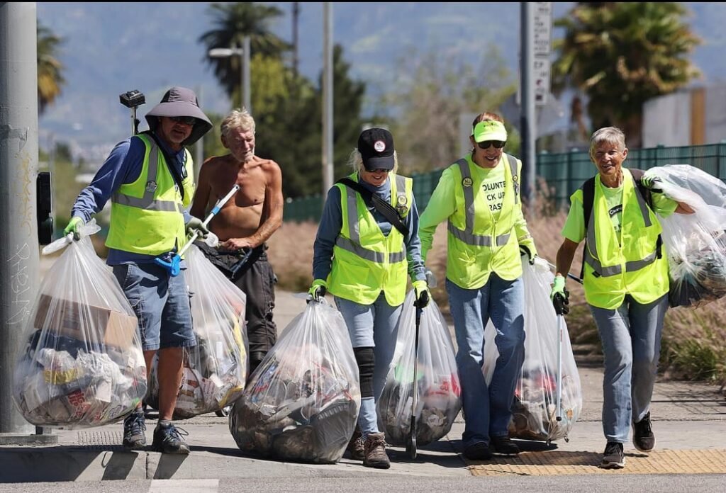 Biohazard cleanup team cleaning hazardous waste with protective equipment